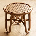 Natural Rattan Round Stool With Woven Seat And Curved Crossed Legs