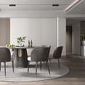 Modern Restaurant Interior With Round Dining Table Gray Chairs Fruits Greenery Wine And White Cabinets