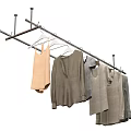 Metal Clothes Hanger With Hanging Sweaters Tank Tops And Casual Clothing