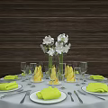 Elegant Tableware Set With White Plates Yellow Napkins And Wine Glasses On Dining Table