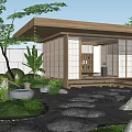 Traditional Japanese Courtyard Garden With Wooden Roof Stone Path And Lush Greenery
