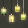 Four Hanging Pendant Lights With Green And Yellow Gradient Cylindrical Striped Shades On Dark Wall