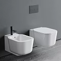 Modern White Wall Mounted Toilet With Matching Bidet Against Gray Wall And Wooden Floor