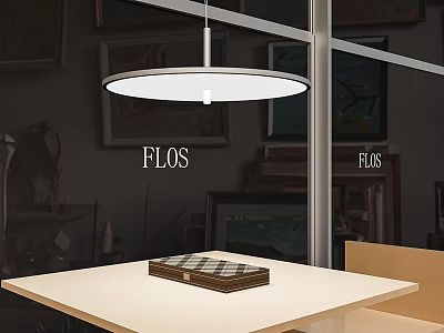FLOS Round White Pendant Light Hanging Above Modern Table In Showroom Interior 3d model