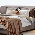 Modern Double Bed Setup With Bedside Tables Ottoman Pillows And Cozy Blankets