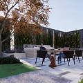 Courtyard Garden Design Featuring Wooden Deck Red Leaf Tree Outdoor Seating And Greenery Wall