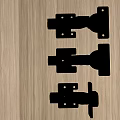 Three Stainless Steel Hinges Displayed On Wooden Surface With Metal Construction