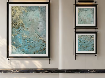 Three Oil Paintings With Blue And Gold Tones Textured Surfaces Hanging On Modern Interior Wall 3d model