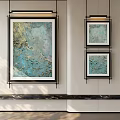 Three Oil Paintings With Blue And Gold Tones Textured Surfaces Hanging On Modern Interior Wall
