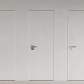 Three White Hinged Doors With Various Handles On Light Colored Wall