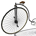 Vintage Bicycle With Large Front Wheel Small Rear Wheel And Brown Saddle
