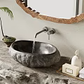 Natural Stone Washbasin with Wall-Mounted Faucet Wooden Frame Mirror and Green Plant in Light-Colored Bathroom