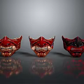 Three Red Traditional Demon Masks with Fierce Expressions and Decorative Patterns Representing Mythical Creature Roles