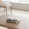 Open Book On Wooden Table With Stacked Books In Minimalist Room