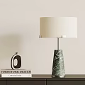 Modern Marble Base Table Lamp with Cream Lampshade on Table Beside Furniture Design Books