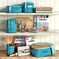 Organized Kitchen Utensils With Blue Storage Containers Metal Holder Wooden Cutting Board And Cookbooks