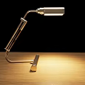 Modern Metal Desk Lamp With Flexible Arm On Wooden Table Warm Light Illumination