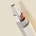 Layered Metal Pipes With Copper Accent Textured Surface And White Casing