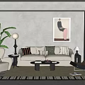 Warm Modern Sofa and Coffee Table Combination with Decorative Throw Pillows Area Rug Floor Lamp Green Plant and Wall Artwork