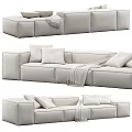 Modern Beige Upholstered Sectional Sofa With Modular Design Soft Cushions And Throw Blanket