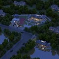 Aerial View Of Illuminated School Building With Courtyard Trees And Water Surroundings