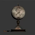 Decorative Ornament Set Featuring Globe With Ornate Base And Maple Leaves Accents