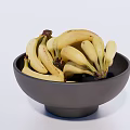 Fresh Ripe Yellow Bananas Placed in Black Ceramic Bowl on White Surface