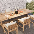 Wooden Outdoor Table with Chairs Cushions Tea Set and Fruits by Brick Wall Greenery