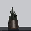 Cactus Bonsai Potted Plant in Dark Clay Pot on Tabletop with Light Background