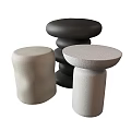 Modern Minimalist Side Tables With Black Beige White Textured Surfaces And Varied Shapes