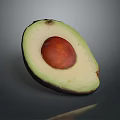 Fresh Half Avocado With Green Flesh And Brown Seed On Gray Background