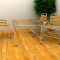 Glass Top Tea Table and Wooden Metal Frame Chairs with Green Plant on Wooden Floor