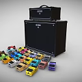 Black Amp Head And Speaker Cabinet Stack With Colorful Guitar Effect Pedals Scattered Around