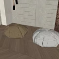 Shell Shaped Cushions in Beige and White on Herringbone Wooden Floor with Potted Plant