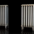 Two Vintage Radiators One White Clean And One Rusty Old On Black Reflective Surface