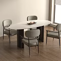 Contemporary Oval Dining Table With Grey Upholstered Chairs And Black Metal Legs