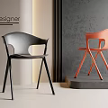 Modern Designer Dining Chairs In Black And Orange With Crossed Legs