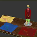 Mannequin Wearing Purple Coat Red Pants Brown Boots Red Christmas Hat With Fabrics On Table