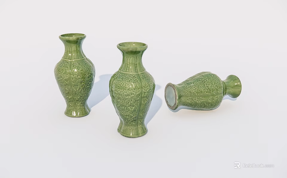 Green Ceramic Vases with Intricate Carvings Two Standing One Lying 3d model
