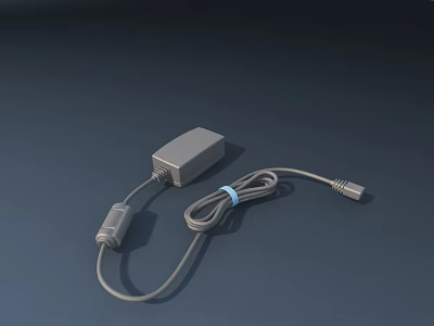 Gray Power Adapter With Bundled Cable Secured By Blue Tape On Dark Surface 3d model