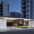 Modern Residential Entrance Gate With Illuminated Columns Covered Awning And High Rise Buildings