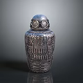 Silver Carved Vessel With Goggle Like Top Design And Intricate Engraved Patterns