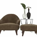 Beige Upholstered Leisure Chair With Ottoman Glass Side Table Vases Plant Blue Wall Wooden Floor