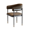 Modern Brown Leather Accent Chair With Sleek Metal Legs And Round Backrest Design