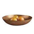 Three Juicy Oranges Resting in a Polished Copper Bowl on White Background