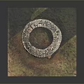 Scenic View of Ancient Circular Stone Structure on Grass and Dirt Ground
