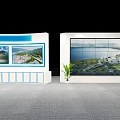 Exhibition Island Featuring Large Display Screens and Landscape Views with Green Plant
