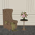 Tufted Beige Wingback Armchair With Draped Blanket Round Side Table Flowers Light Wall Geometric Rug
