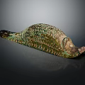 Ancient Bronze Fish Shaped Artifact With Green Patina And Scale Patterns