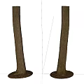 Two Wooden Tree Trunks With Natural Stone Bases As Decorative Elements